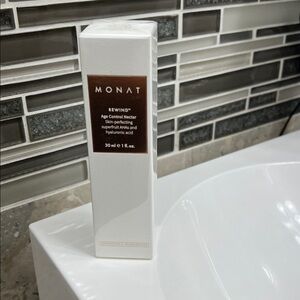 MONAT Rewind Anti-Aging Serum - White and Brown